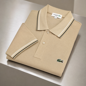 “Folded Lacoste slim fit tan polo shirt with embroidered logo”